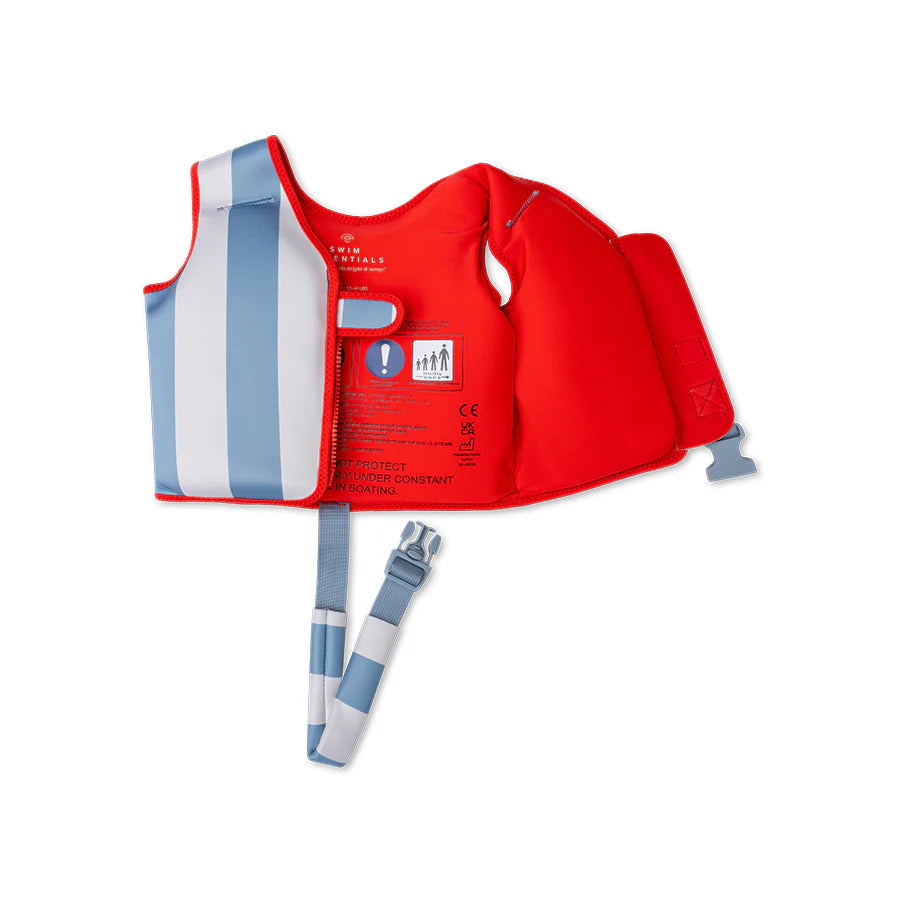 Close-up of the adjustable safety straps and secure buckle on the red and blue swim vest.