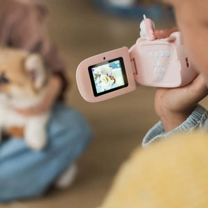 Child holding the Zoofamily kids’ camera