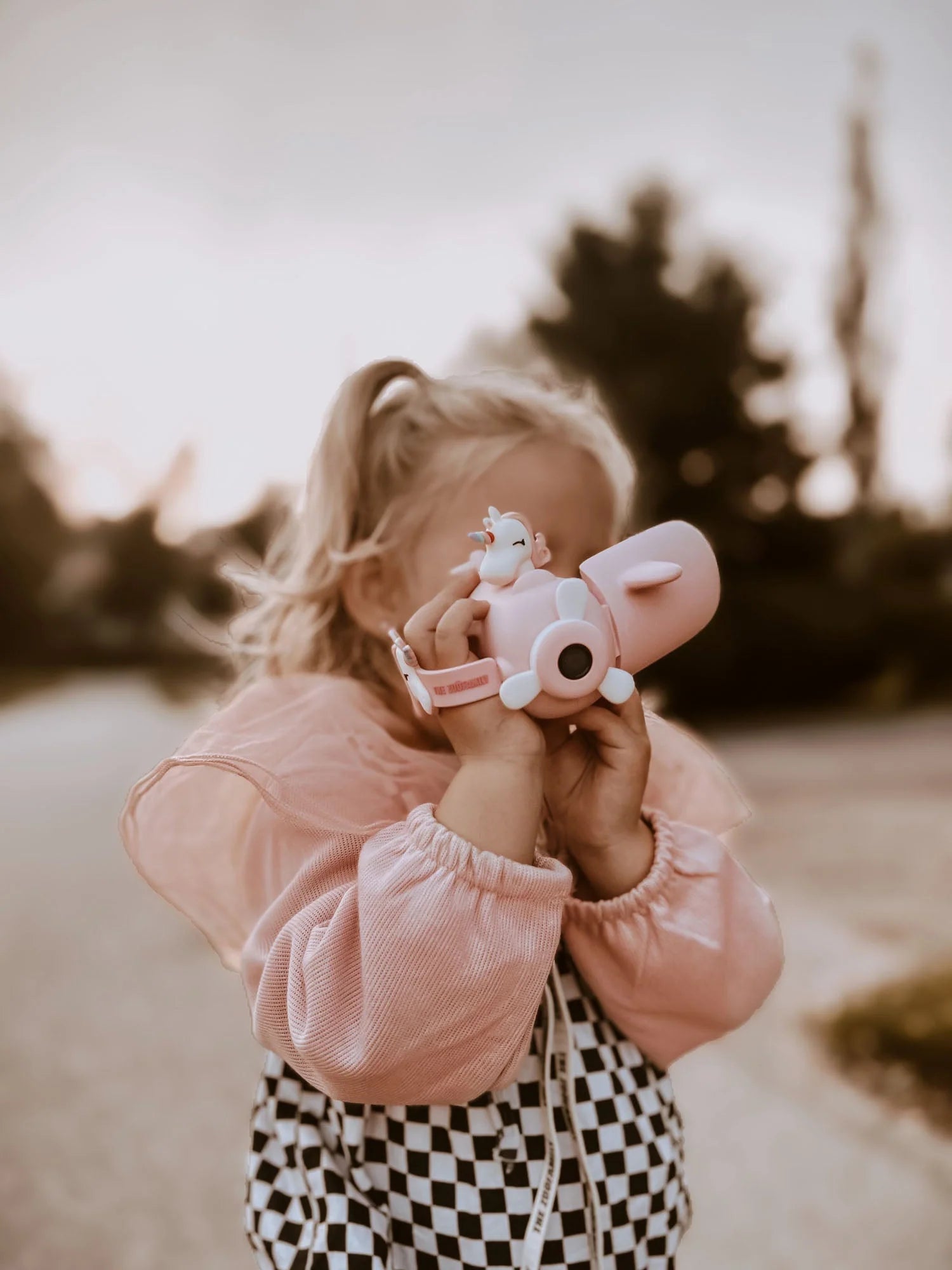Kids recording video with zoo video camera.
