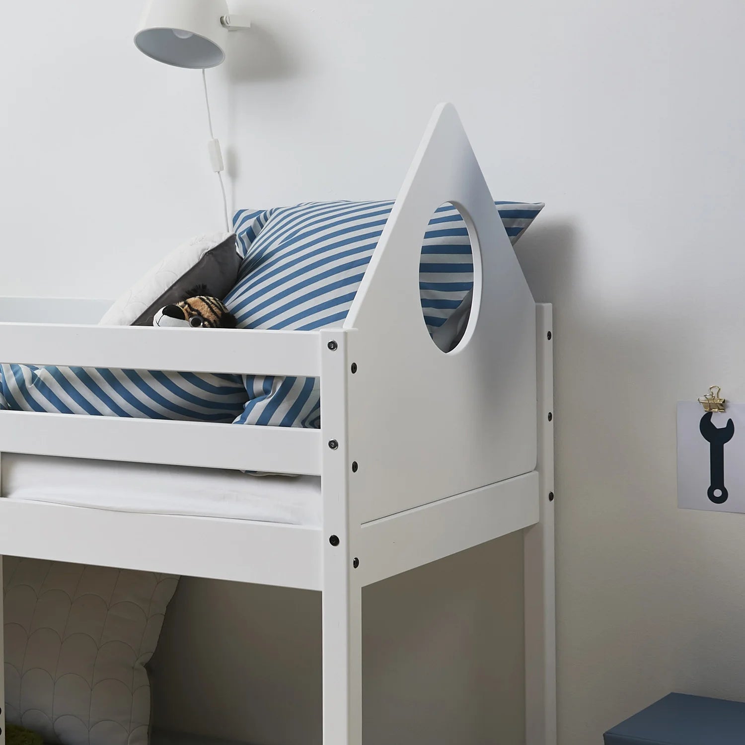 Triangular-shaped headboard on the Thuka mid sleeper bed.