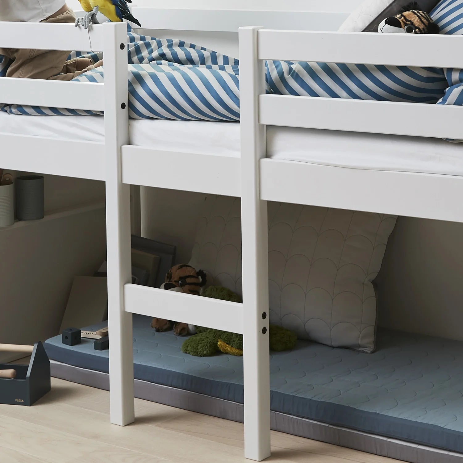 The Thuka mid sleeper bed features a ladder positioned in the centre of the bed.