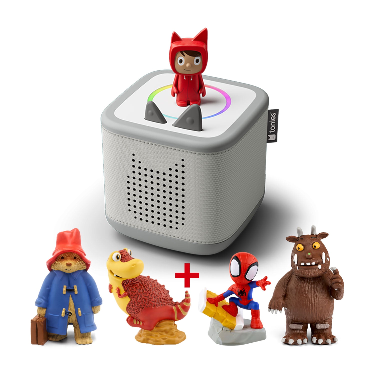 A Moon Grey Toniebox 2 audio player with a red Creative-Tonie on top, surrounded by four Tonie figures: Paddington Bear, a red T-Rex dinosaur, Spider-Man, and the Gruffalo.