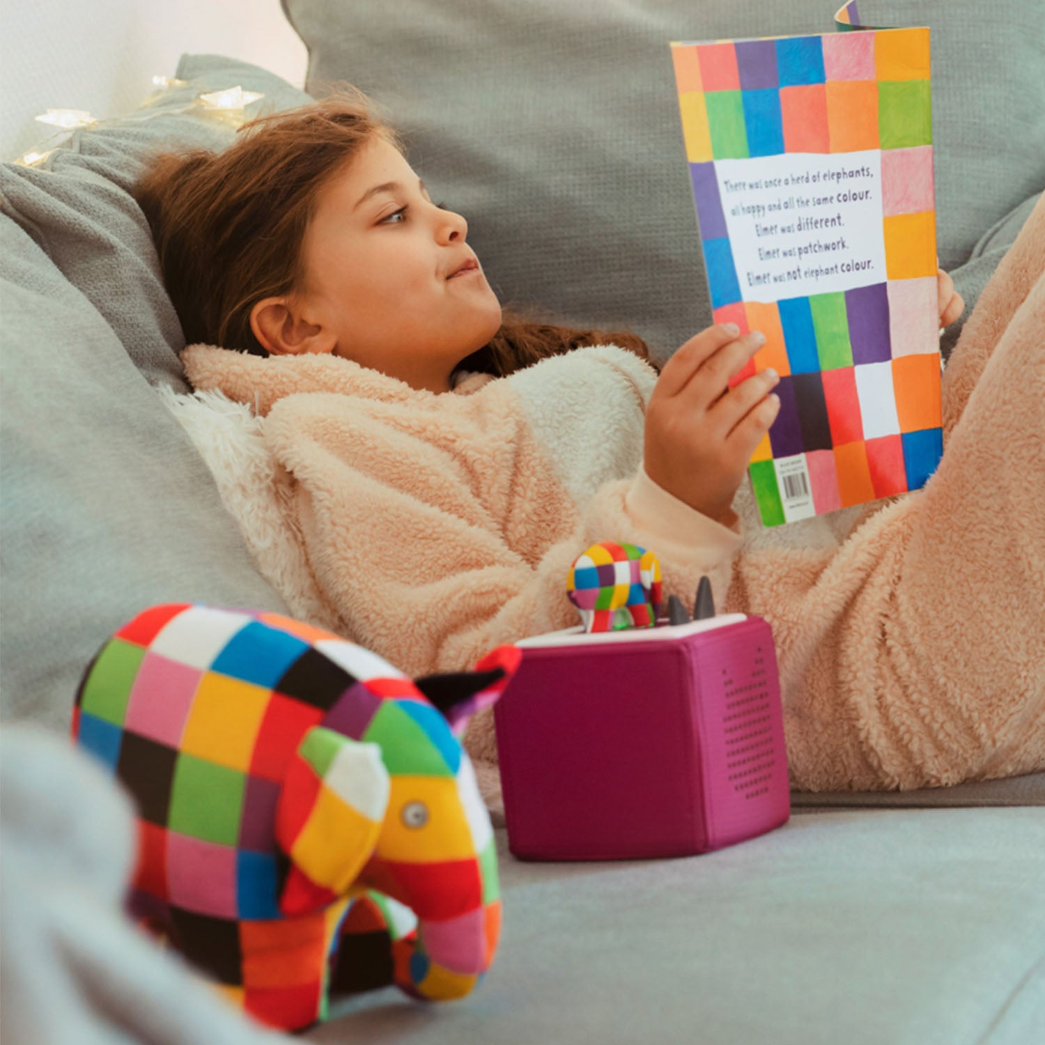 Children listening to Elmer stories on Toniebox