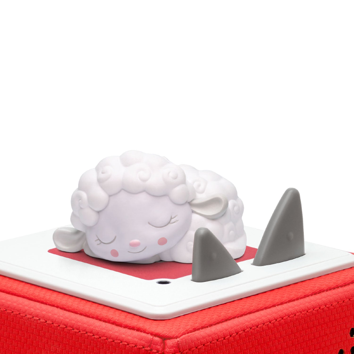 Sleepy Sheep figurine placed on a Toniebox.