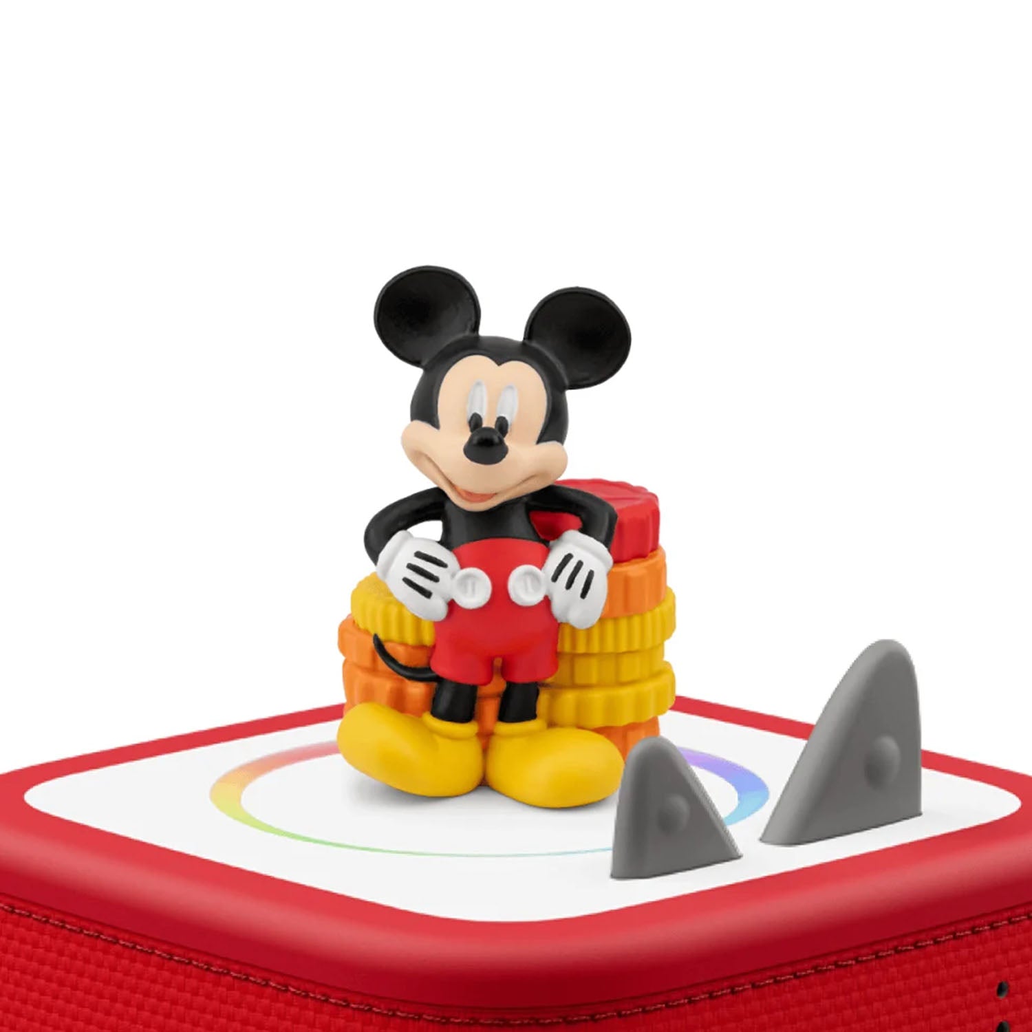 Tonies Disney Mickey Mouse Clubhouse audio figure placed magnetically on top of a red Toniebox speaker to demonstrate how to start playing the audio.