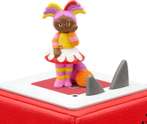 Upsy Daisy Tonie figurine standing on top of a red Toniebox speaker.