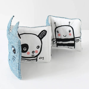 High-contrast animal illustrations inside baby soft book.