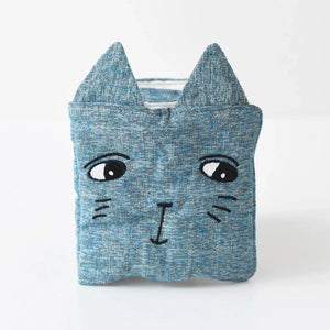 Tummy time with baby using Friendly Face in the Garden cloth book.