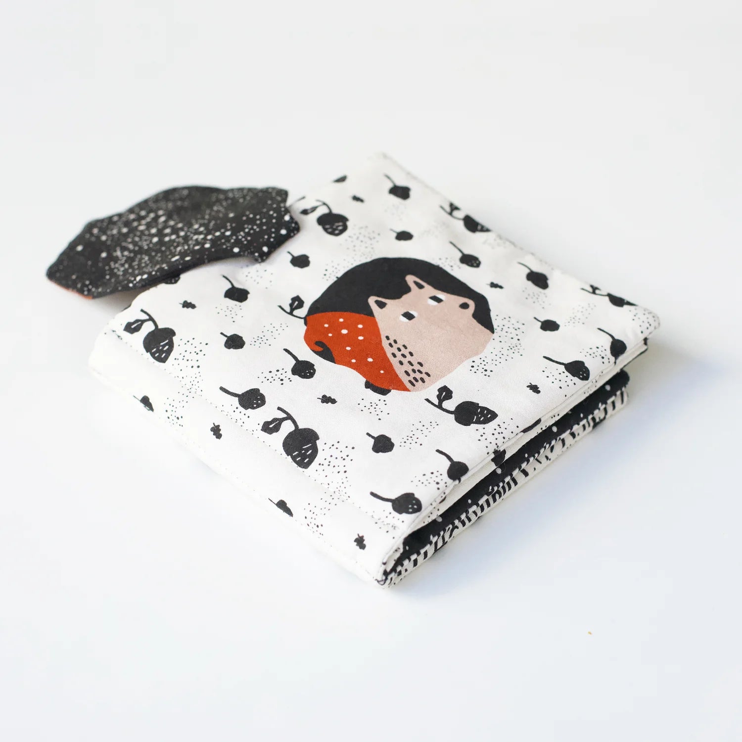 Soft fabric pages are easy for little hands to grip and hold