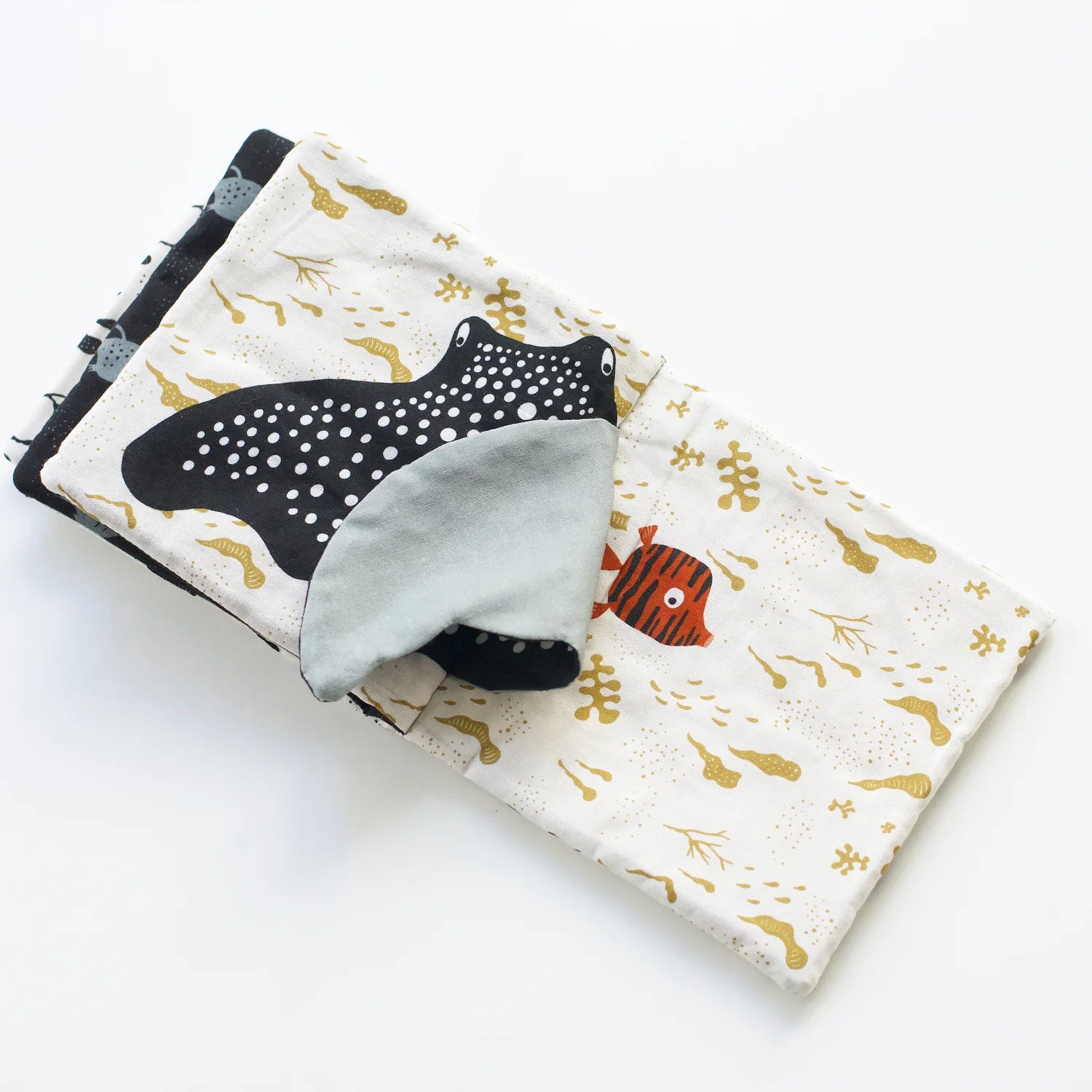 Interactive flaps with crinkle paper reveal hidden illustrations for sensory play