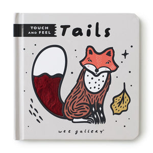 Wee Gallery “Tails” touch-and-feel board book showing cute whale with soft textured tail