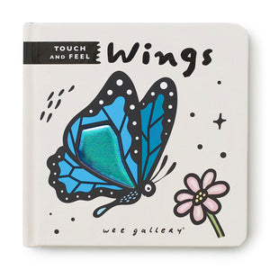 Wee Gallery “Wings” touch-and-feel board book featuring dragonfly with glittery wings