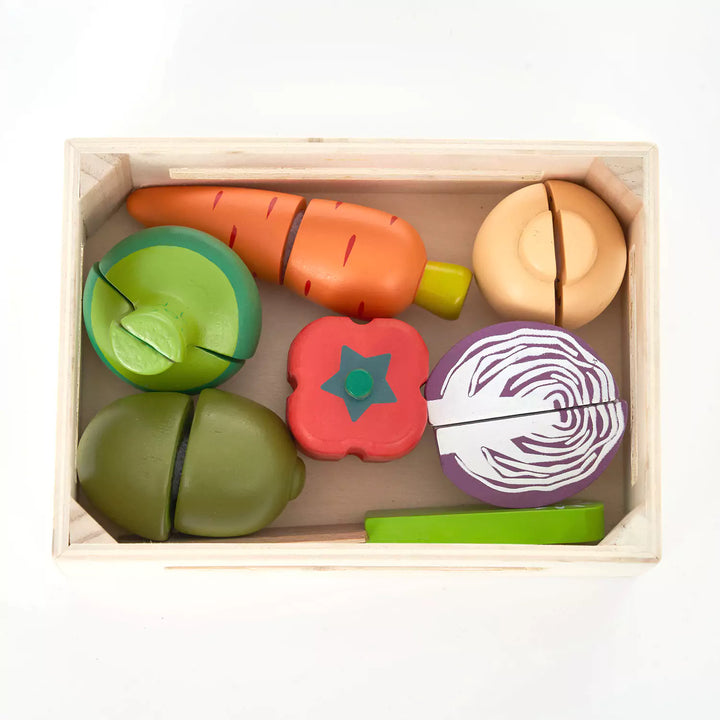 wooden play food set vegetables neatly organized in a crate