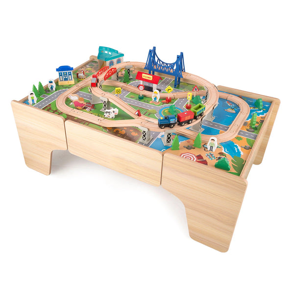 Hooga Wooden Train Set Table with a colorful wooden track layout, trains, and accessories arranged on the tabletop.