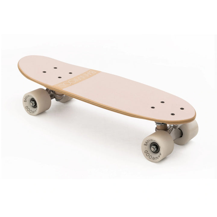 A Banwood Skateboard in a light colour with grip tape that is soft and clear.