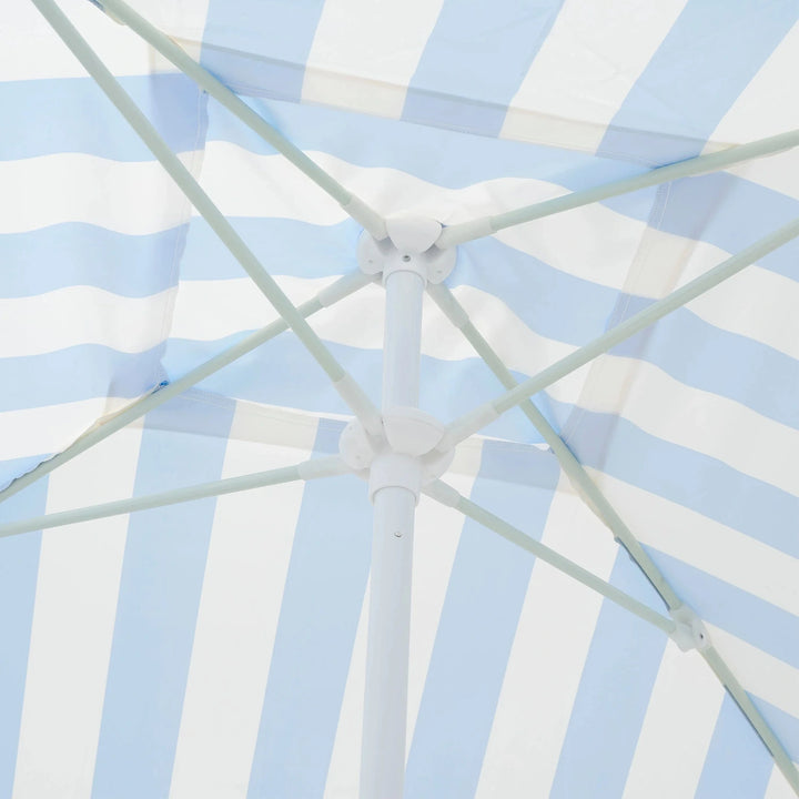 The classic blue and cream stripe design adds a touch of seaside elegance to your beach setup.