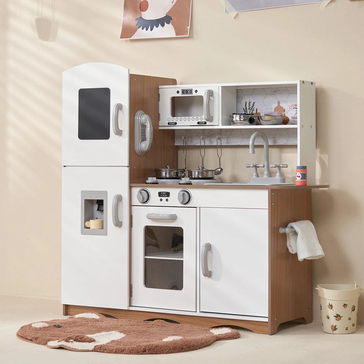 This child-sized wooden kitchen is perfect for imaginative play, with interactive appliances and ample storage space for play food and accessories