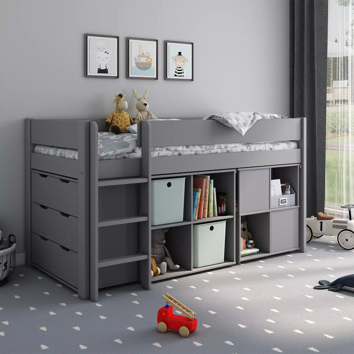 Functional and stylish grey sleeper bed with built-in desk and ample storage for a well-organised kids' space.