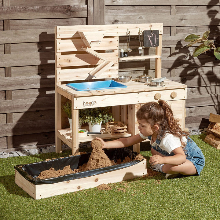 Children playing happily with the Hooga Wooden Mud Kitchen