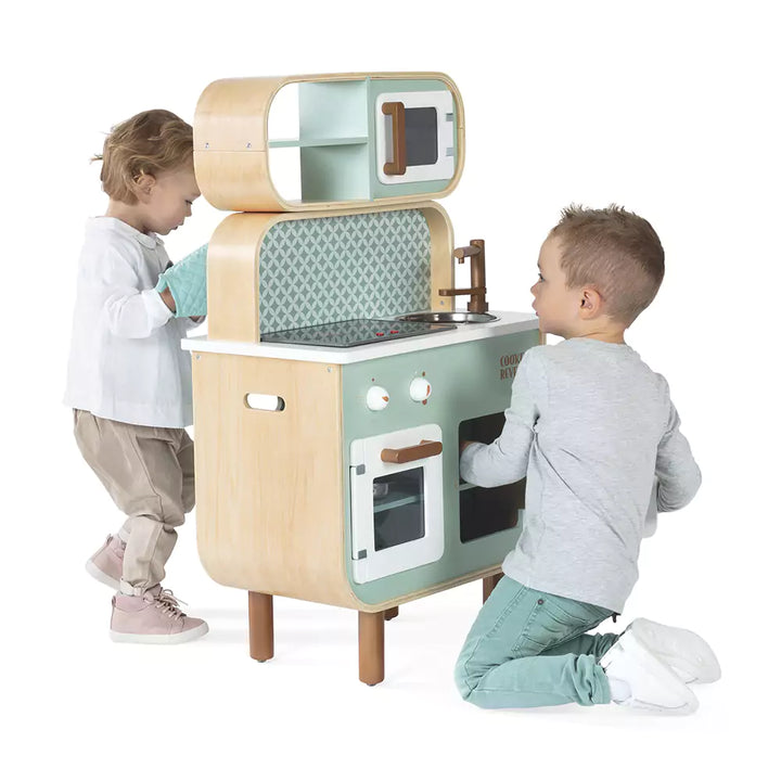 Two child playing with the kitchen toy