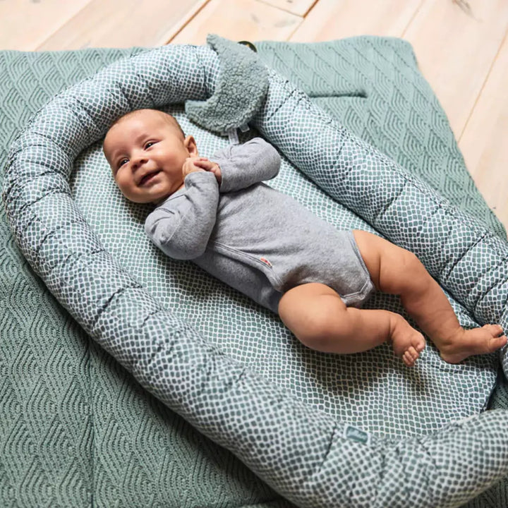 Baby sleeping on Soft Cot
