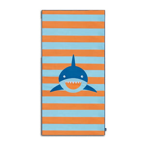 Kids Beach Towel with Shark Print spread out on the sand - Displaying the cool and trendy shark design.