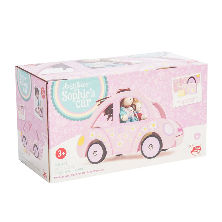 Le Toy Van Sophie's Toy Car (Pink) displayed in a child's playroom