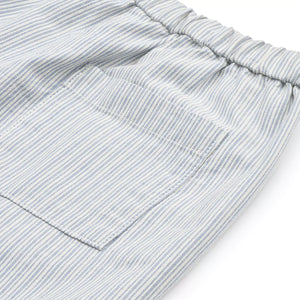 Front and back pockets add both convenience and style to the striped design, perfect for storing tiny treasures.