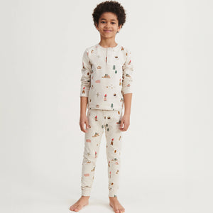 Child wearing Liewood Kids Pyjamas Set, enjoying a peaceful night's sleep in soft organic cotton.
