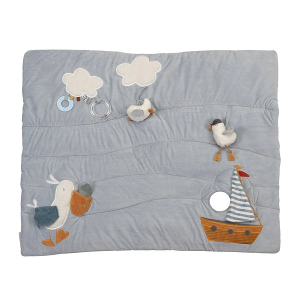 Harbour-themed Little Dutch Playmat for sensory stimulation in baby's playpen.