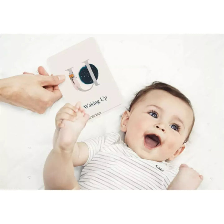 Baby with Milestone Card