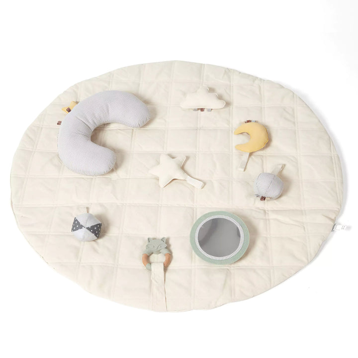Full view of organic baby play mat with pillow and toys.
