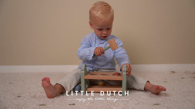 Video of toddler enjoying chicken egg hammer game.