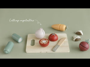 Promote fine motor skills and creative play with this set of sliceable wooden vegetables, including a wooden knife and cutting board.