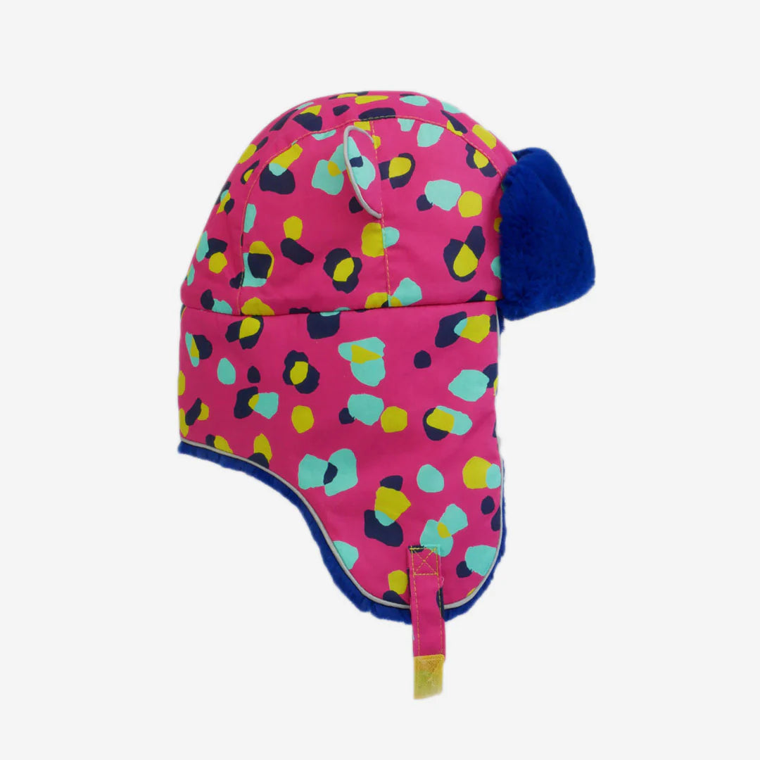 Colorful patterned baby hat with a strap on a white background