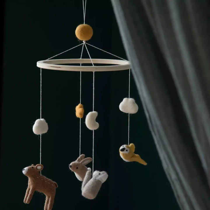 Handmade baby mobile with Nightfall theme motifs