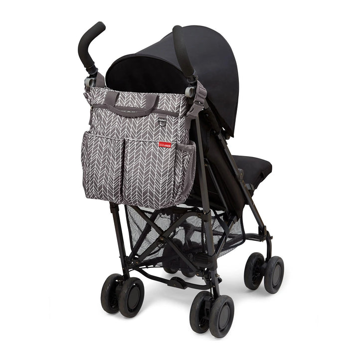 Stroller straps and cushioned changing pad included
