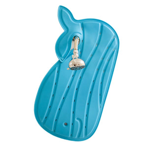 Skip Hop Moby Bath Mat In Blue hanging on a shower rod