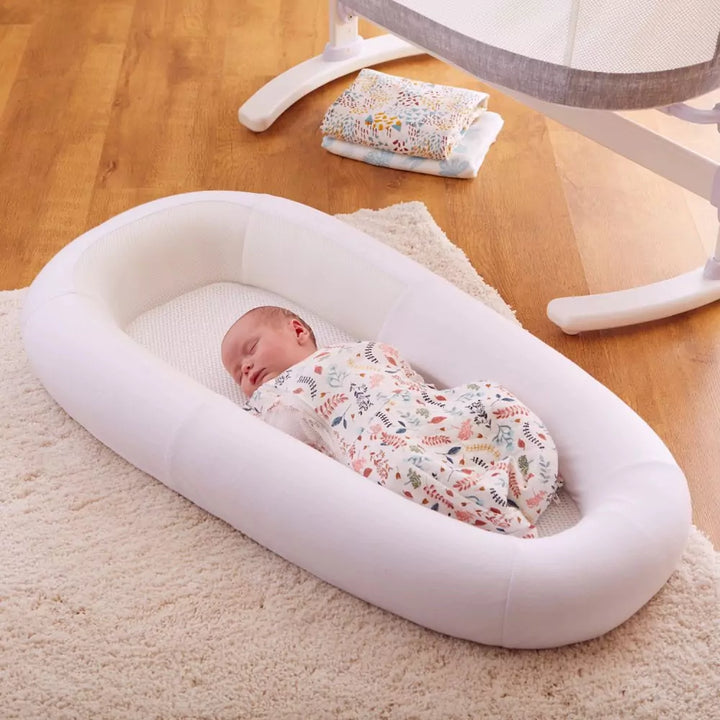 Baby sleeping in the soft white baby mattress from Purflo 