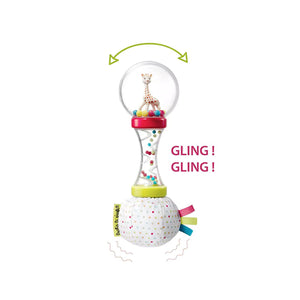 A baby rattle with a yellow giraffe on top and the text "GLING! GLING!" written on it.