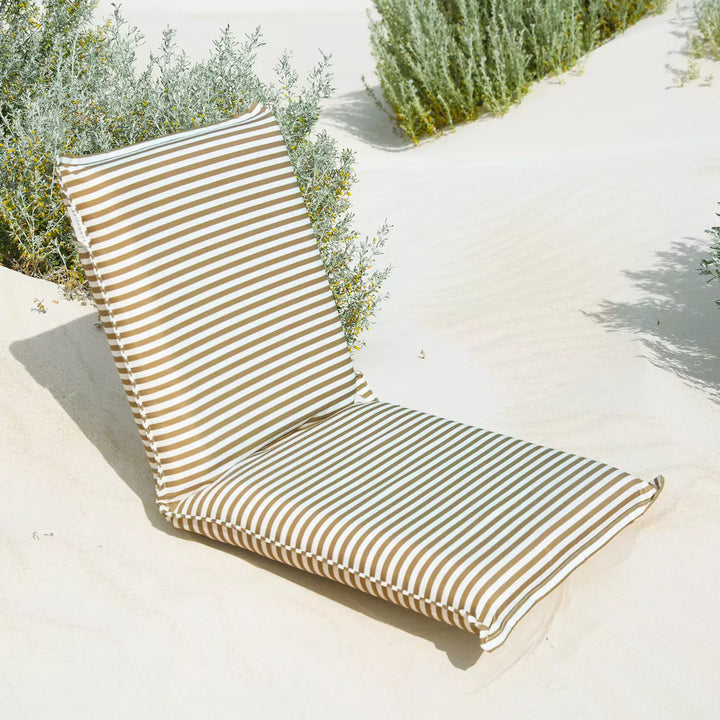 Relax by the shore with the Sunnylife folding chair's stylish Khaki Stripe design, adding a touch of elegance to your outdoor lounging experience.