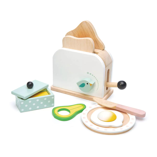 Wooden toaster breakfast set with poached egg and avocado
